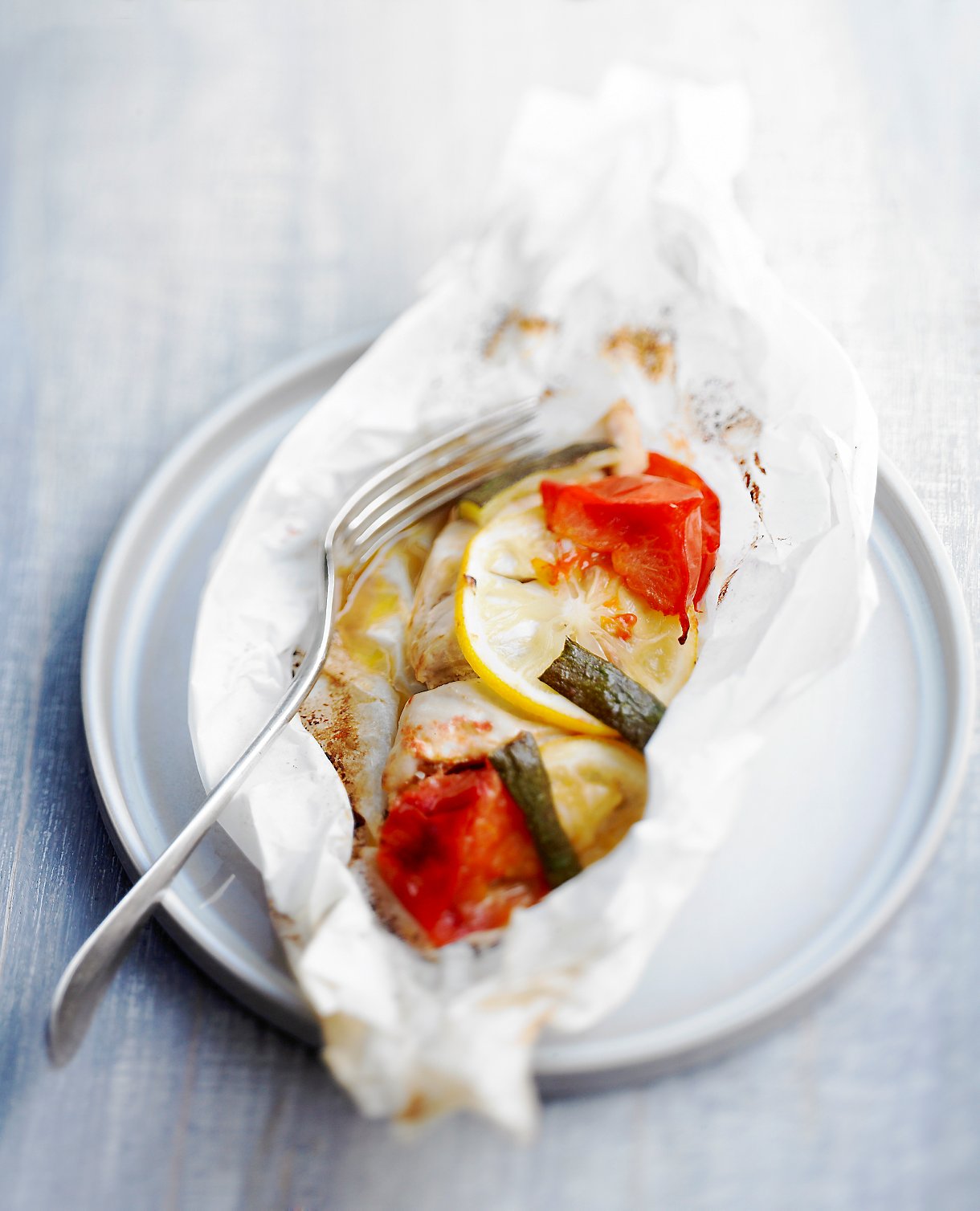 Papillote de poulet aux courgettes, tomates et citron - Spécial Gastronomie