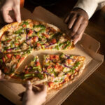 Tout savoir sur Domino’s Pizza, la multinationale de la restauration