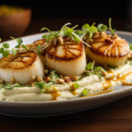 La meilleure recette de noix de saint-jacques flambées au whisky​
